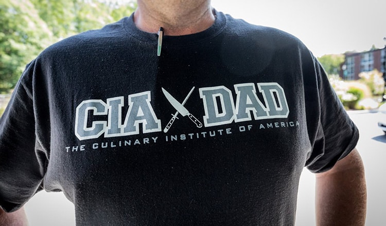 Man in CIA DAD t-shirt