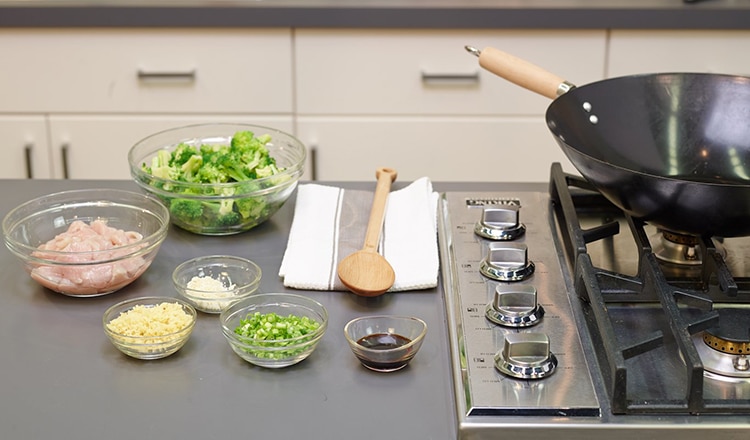 Mise en place for chicken and broccoli stir-fry.