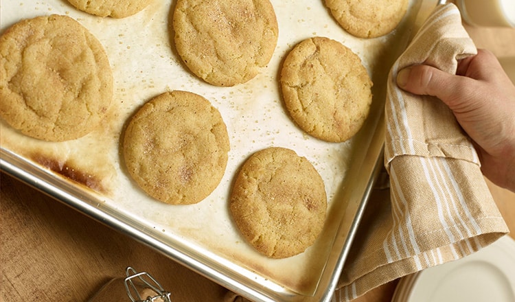 Snickerdoodle cookies on baking sheet