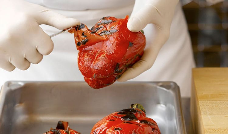 Peeling roasted red peppers