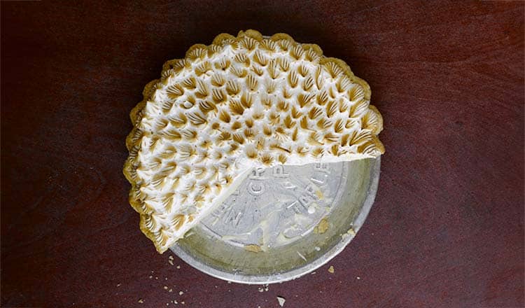 Toasted meringue pie, in a metal pie pan
