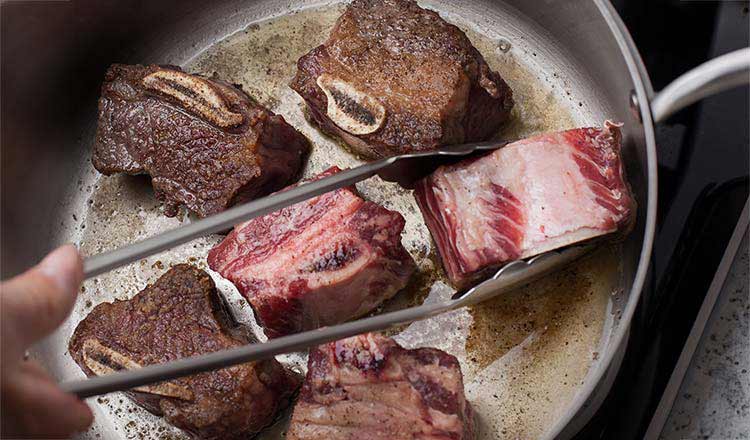 Searing beef short ribs
