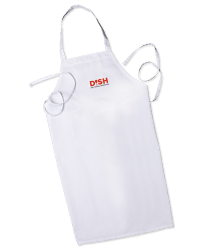 A white DISH kitchen apron featuring the embroidered red DISH logo at the center chest, designed for everyday cooking and included with annual memberships.