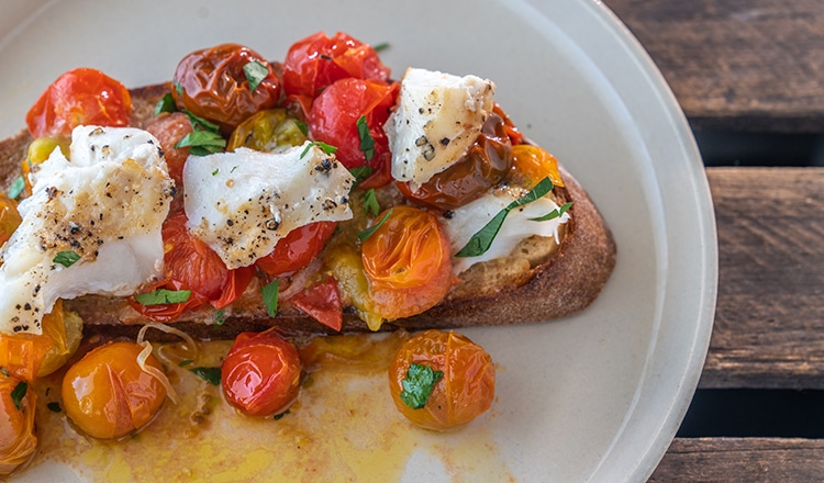 Cod and burst tomato toast